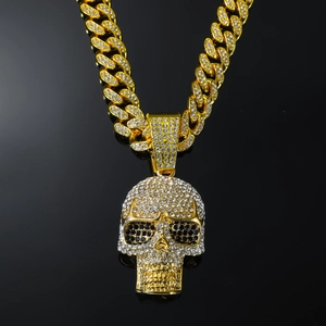 Hip-hop style gold cuban chain with iced-out skull pendant and white crystal stones