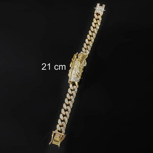 Macro shot of 21 cm iced-out hip hop Cuban link bracelet with 3D embossed figure