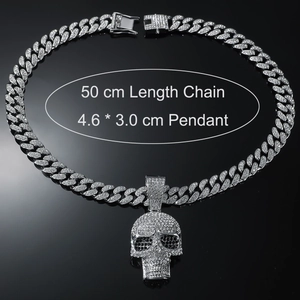 Detail showing 50cm silver cuban chain with iced out skull pendant and product dimensions