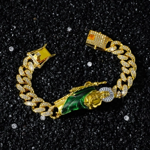 Hip hop style gold Cuban link bracelet with St. Jude pendant and white rhinestones