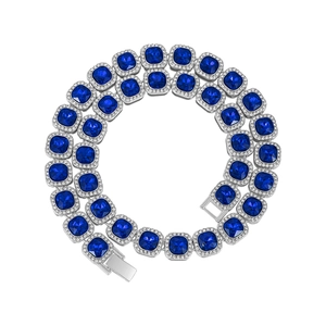 Macro detail of square blue sapphire halo necklace with silver pave crystal setting