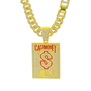 Close-up of hip-hop pendant with red CASHMONEY text and crown detail on Cuban chain