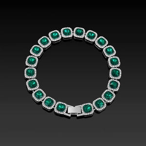 Detail of square-cut emerald glass bracelet with pavé crystal halo and buckle clasp