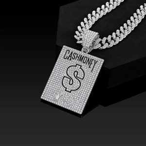 Macro side view of hip hop Cuban chain with diamond-encrusted Cash Money dollar pendant