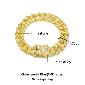 Detailansicht eines 13mm goldenen Panzerarmbands mit Strasssteinen und Verschluss