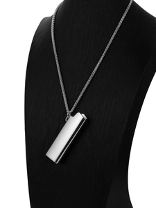 Polished silver lighter pendant on a woven chain displayed on a black silk bust