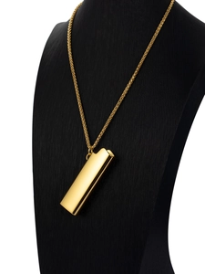 Polished gold lighter pendant on a durable rope chain displayed on a black bust