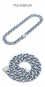 Detailopname van 14mm cubaanse schakelketting met blauwe en witte kristallen inlay