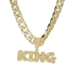 Iced out gold Cuban link chain necklace with large KING letter pendant for men