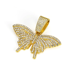 Macro detail of gold plated butterfly pendant with pavé set crystals and large bail