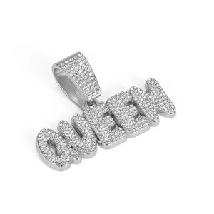 Macro view of silver silver alloy QUEEN letter pendant with micro-pave diamond setting