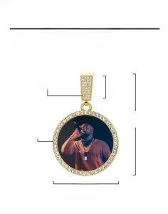 Detailed view showing dimensions of circular gold pendant with rhinestones and portrait