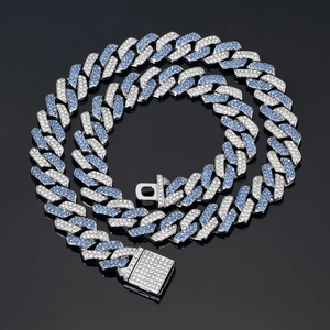 Detail view of pink and blue rhinestone Cuban link chain with icy diamond box clasp
