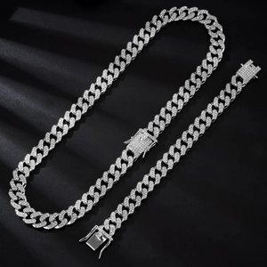 Silver iced-out Cuban chain set with pavé crystals on rectangular clasp and links
