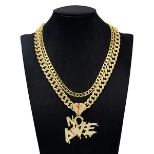 Hip hop gold Cuban chain necklace with iced-out NO LOVE pendant and red heart detail