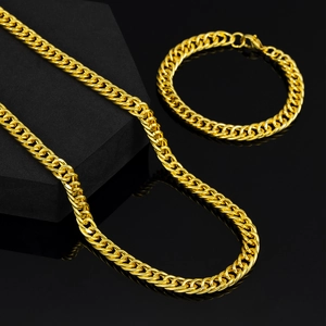 Detailed view of 8mm gold cuban curb link chain and bracelet set for hip-hop fashion
