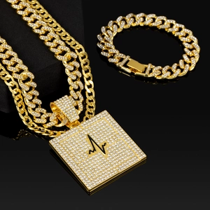 Ensemble collier et bracelet cubains dorés avec pendentif carré à motif d'électrocardiogramme