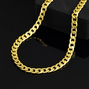 7mm gold Cuban link chain necklace for men in hip hop style on black reflective display