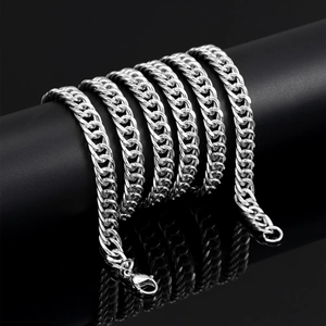 Detailed close-up of 8mm silver cuban link chain with secure lobster clasp on black background