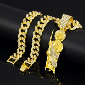 Detail of hip hop gold plated Cuban link chain with iced out Saint Jude pendant on stand