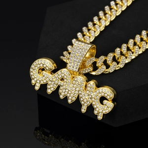 Hip-hop iced out Cuban link chain with gold plated GANG letter pendant and white rhinestones