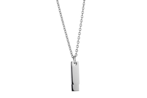 Macro view of polished stainless steel rectangular pendant on a classic silver link chain