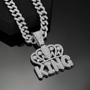 Silver Cuban link necklace with iced out crown KING pendant in hip hop style