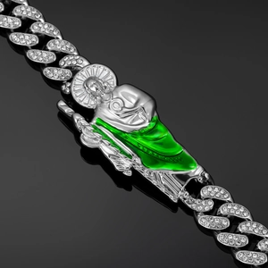 Detailed close-up of Cuban link bracelet with St. Jude pendant and green enamel