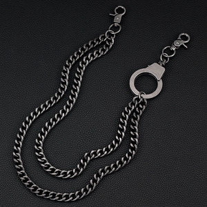 Detail of hip hop double-layered silver pant chain with handcuff clasp and lobster hooks