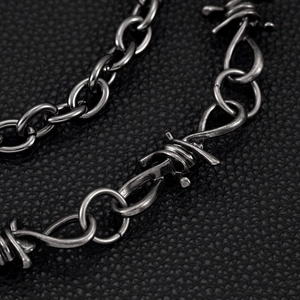 Double-layered hip hop denim chain with vintage barbed wire design on black leather