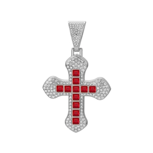 Detailed view of silver cross pendant with red square gemstones and micro-pave white crystals