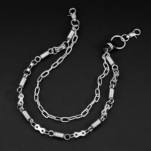 Close-up of double-layered punk metal pants chain with spring rings and bike chain links