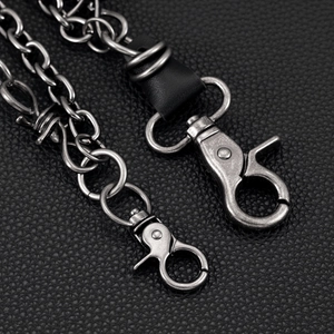 Double-layered hip-hop pant chain in antique black metal with leather connector