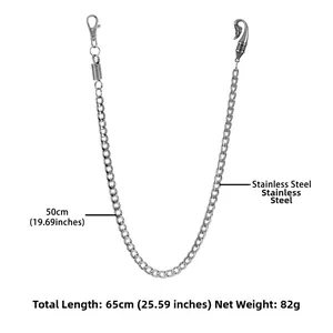 Detail of 65cm silver curb chain pants accessory with ornate engraved metal hook clasp