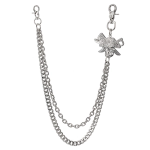 Detail of silver double-layered hip hop chain with rhinestone pirate skull and cross swords