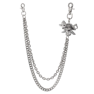Detail of silver double-layered hip-hop pant chain with pirate skull and crossbones charm