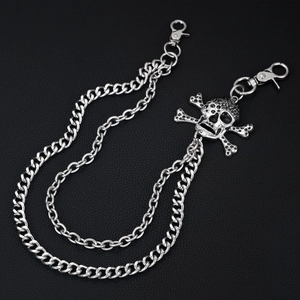 Detail of silver double layer punk pant chain with black rhinestone skull pendant