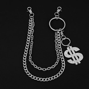 Detail of multi-layer silver hip hop pants chain with sparkling dollar sign pendant