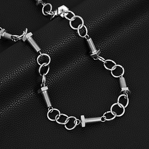 Industrial punk style silver chain necklace with hexagonal screw bolts and metal rings