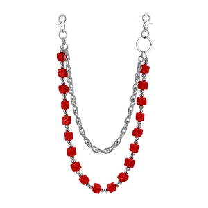 Detail view of double-layer pant chain with red dice beads and polished silver metal links
