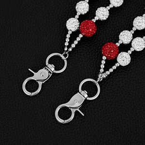 Detailed close-up of 14mm red and white crystal disco ball beads on hip hop waist chains