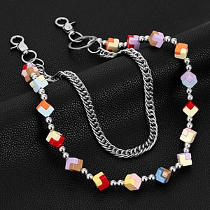 Close-up of double-layer street style waist chain with colorful geometric block charms
