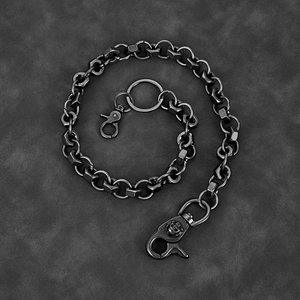 Industrial dark gray metal waist chain featuring skull lobster clasp and hexagonal links