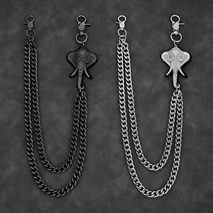Close-up of double layer metal trouser chains with elephant head pendant and spring clasps
