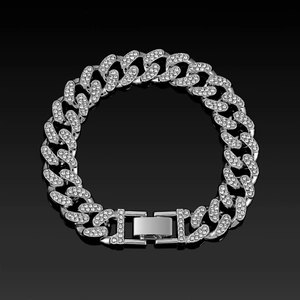 Macro shot of 13mm silver iced out Cuban link bracelet with clear rhinestones on black base