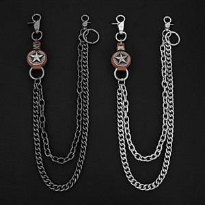 Close-up of double layer punk wallet chain with metal stars and brown leather detail
