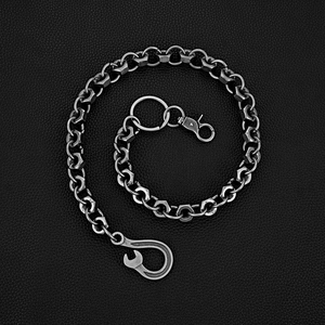 Industrial retro silver metal trouser chain with nut links and wrench hook on leather
