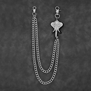Detailed view of vintage silver double-layer chain with carved elephant pendant