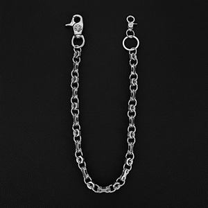 Detail of silver biker wallet chain with industrial nuts and lion head lobster clasp
