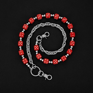 Edgy waist chain with vibrant red dice beads and silver metal links on black leather